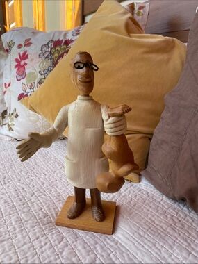 Hand-Carved Wooden Figurine - Neutral Tones